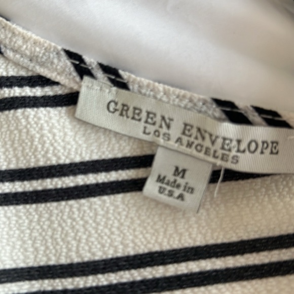 Straight cut, flared sleeve blouse with black tie up in back. Green Envelope. - Picture 9 of 10